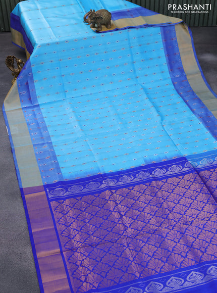 Pure uppada silk saree light blue and blue with allover zari woven floral buttas and zari woven border