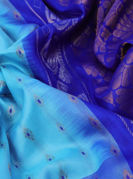 Pure uppada silk saree light blue and blue with allover zari woven floral buttas and zari woven border