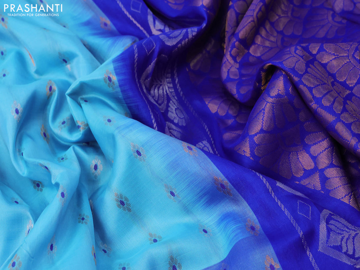 Pure uppada silk saree light blue and blue with allover zari woven floral buttas and zari woven border