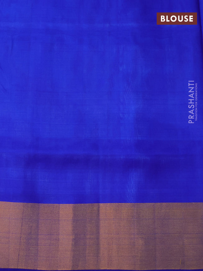 Pure uppada silk saree light blue and blue with allover zari woven floral buttas and zari woven border