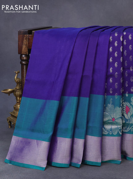 Pure uppada silk saree blue and dual shade of teal blue with allover silver zari woven paisley buttas and long rich silver zari woven border