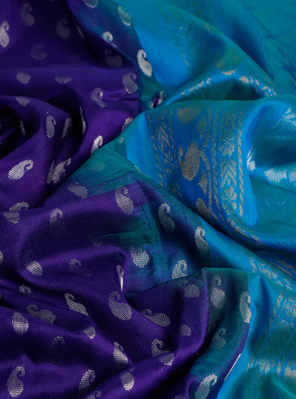 Pure uppada silk saree blue and dual shade of teal blue with allover silver zari woven paisley buttas and long rich silver zari woven border