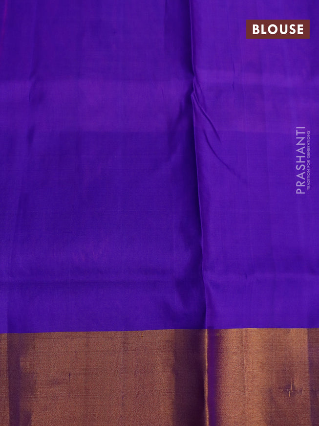 Pure uppada silk saree pink and blue with allover zari woven buttas and long floral design zari woven border