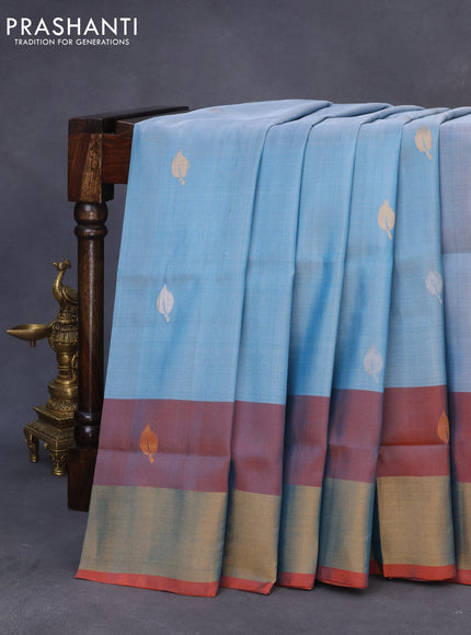 Pure uppada silk saree pastel blue and dual shade of pinkish orange with silver & gold leaf zari woven buttas and zari woven border