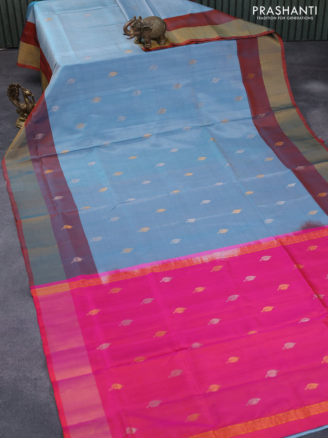 Pure uppada silk saree pastel blue and dual shade of pinkish orange with silver & gold leaf zari woven buttas and zari woven border