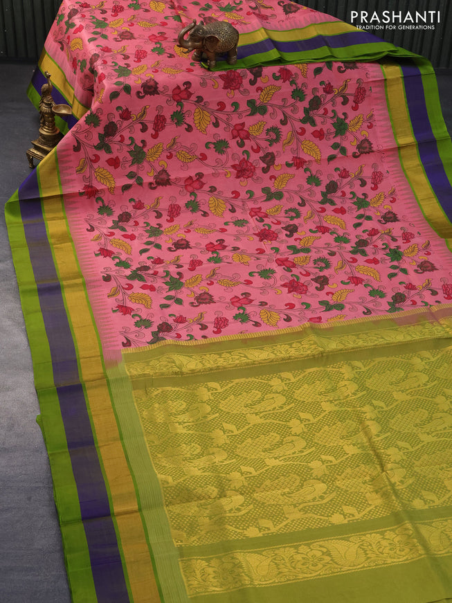 Silk cotton saree peach pink and light green with allover floral kalamkari prints and temple design zari woven simple border