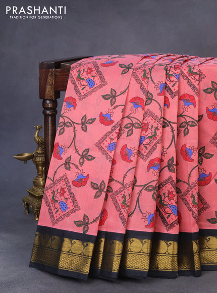 Silk cotton saree peach pink and black with allover kalamkari prints and paisley design zari woven border