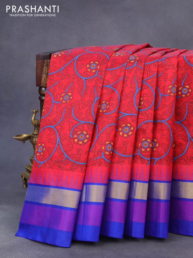 Silk cotton saree red and blue with allover kalamkari prints and temple design zari woven simple border