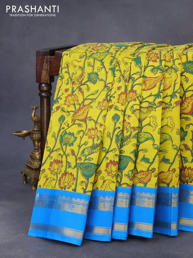 Silk cotton saree lime yellow and cs blue with allover kalamkari prints and zari woven korvai border