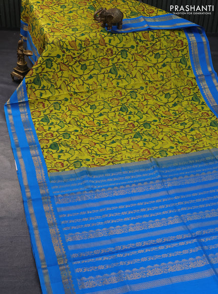 Silk cotton saree lime yellow and cs blue with allover kalamkari prints and zari woven korvai border