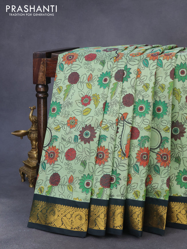 Silk cotton saree pastel green and dark green with allover kalamkari prints and zari woven korvai border