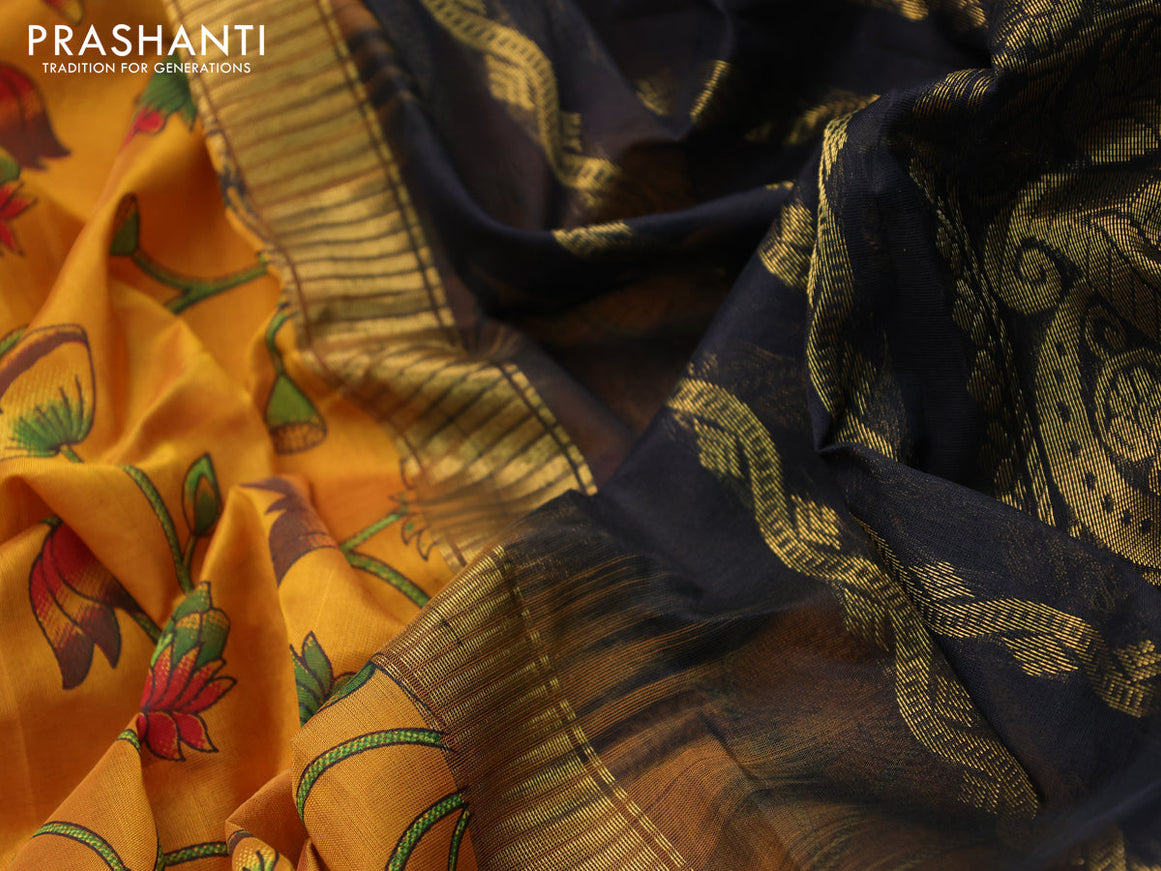 Silk cotton saree mustard yellow and black with allover kalamkari prints and zari woven korvai border