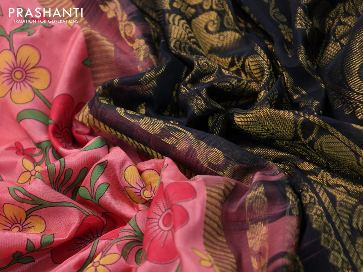 Silk cotton saree peach pink and black with allover floral prints and zari woven korvai border