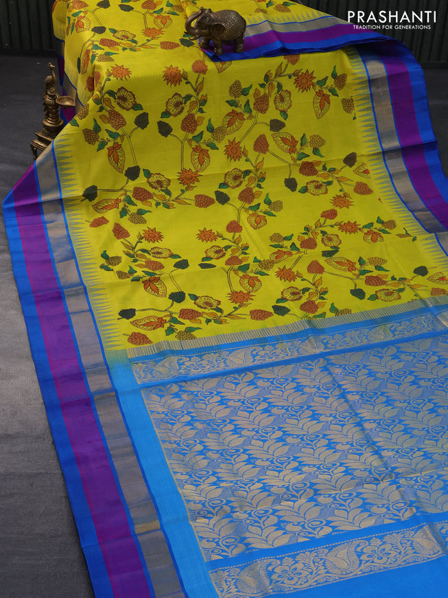 Silk cotton saree lime yellow and cs blue with allover kalamkari prints and temple design zari woven simple border