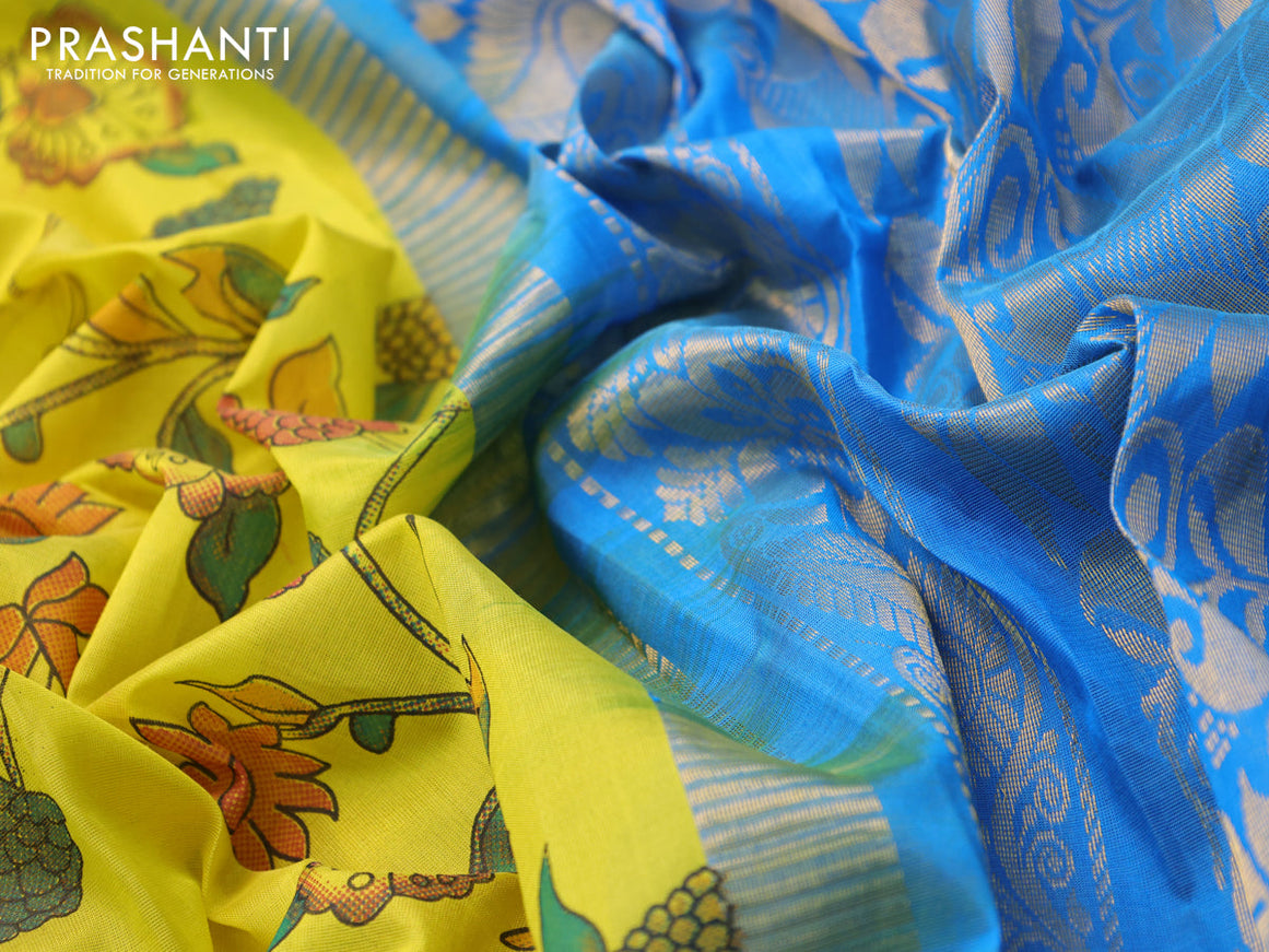 Silk cotton saree lime yellow and cs blue with allover kalamkari prints and temple design zari woven simple border