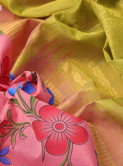 Silk cotton saree peach pink and light green with allover floral prints and zari woven korvai border