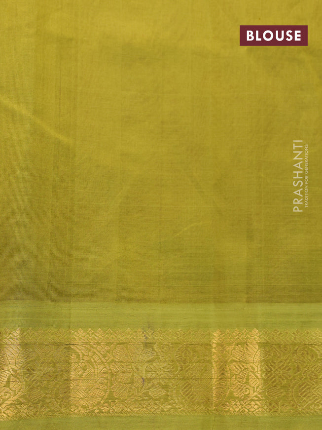 Silk cotton saree peach pink and light green with allover floral prints and zari woven korvai border