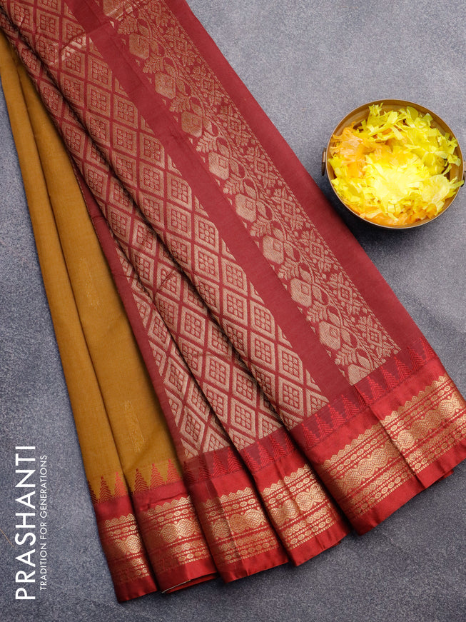 Gadwal cotton saree dark mustard shade and maroon with zari woven buttas and temple design zari woven border