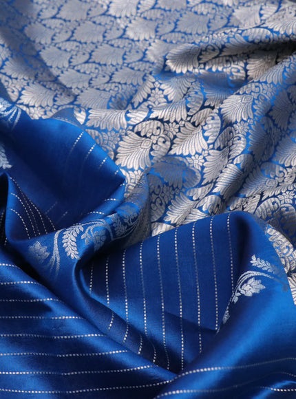 Chiniya silk saree cs blue with allover zari weaves and zari woven simple border