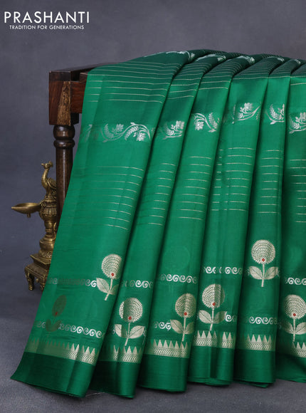 Chiniya silk saree green with allover zari weaves and zari woven simple border