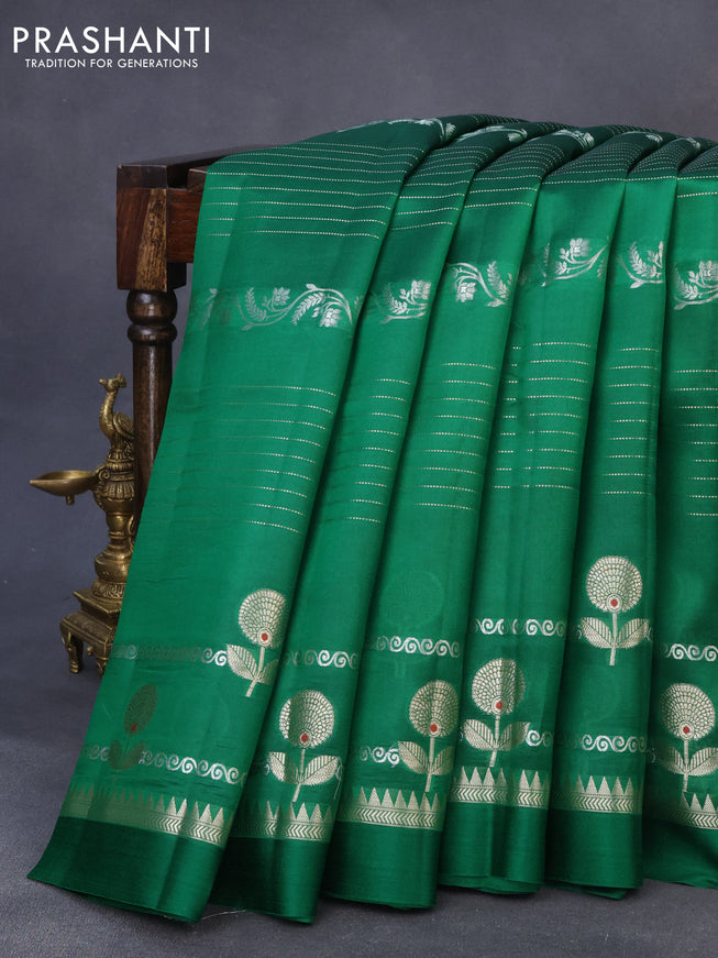 Chiniya silk saree green with allover zari weaves and zari woven simple border