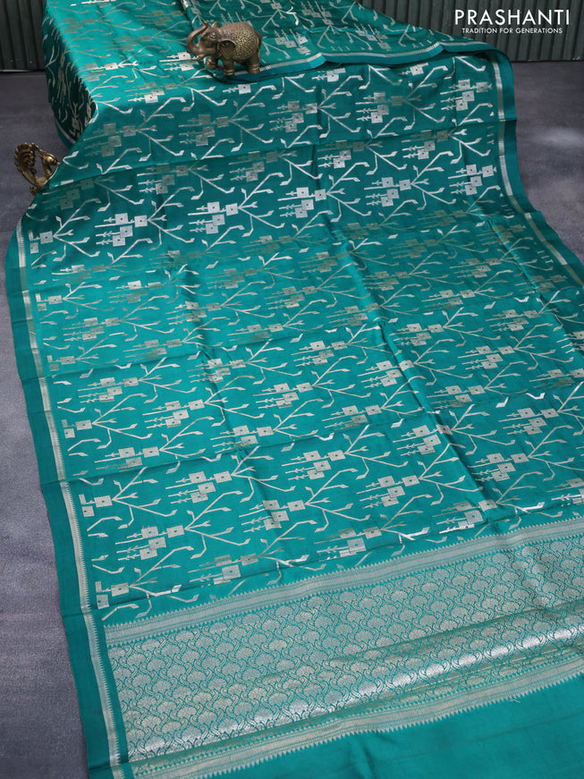 Chiniya silk saree green with allover silver zari weaves and zari woven simple border