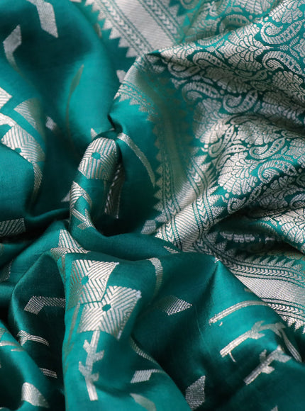 Chiniya silk saree green with allover silver zari weaves and zari woven simple border