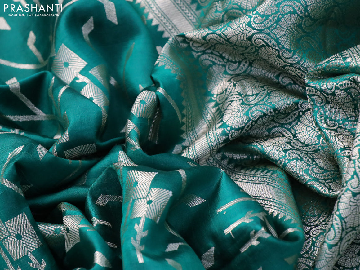 Chiniya silk saree green with allover silver zari weaves and zari woven simple border