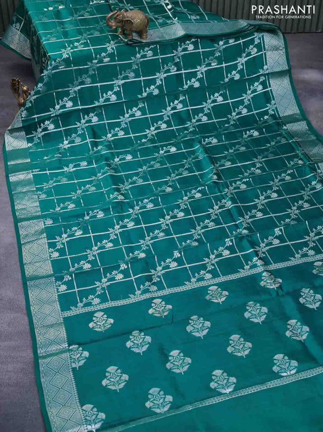 Chiniya silk saree teal green with allover silver zari checks & weaves and silver zari woven border