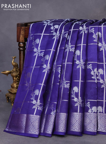 Chiniya silk saree blue with allover silver zari checks & weaves and silver zari woven border