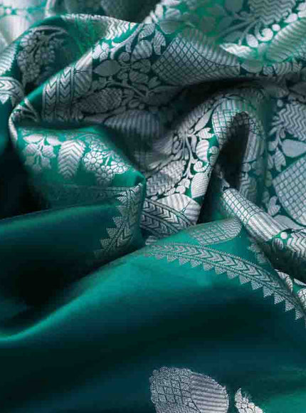 Chiniya silk saree teal green with silver zari woven floral buttas and zari woven simple border