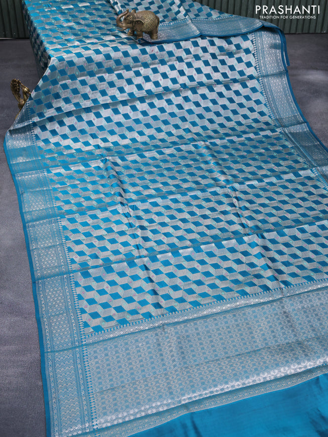 Chiniya silk saree cs blue with allover zari woven geometric weaves and silver zari woven border