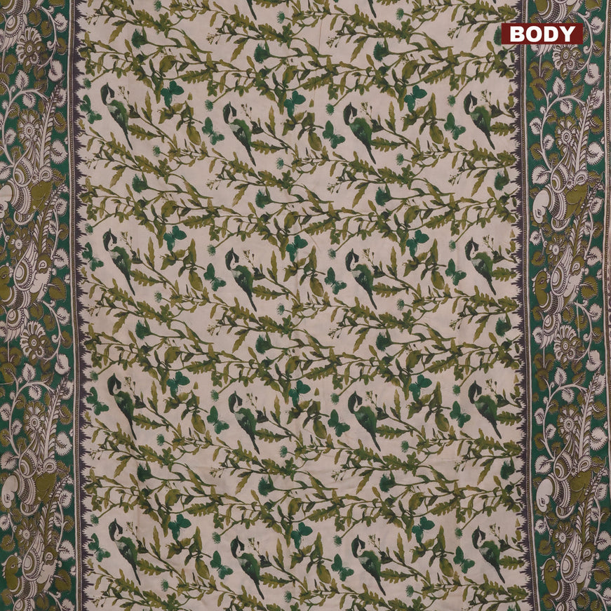 Kalamkari semi silk saree beige and green with allover prints and printed border