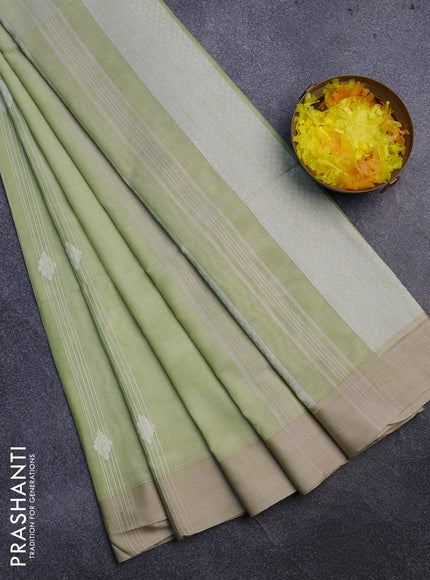 Khadi cotton sarees pista green and beige with allover thread weaves and simple border