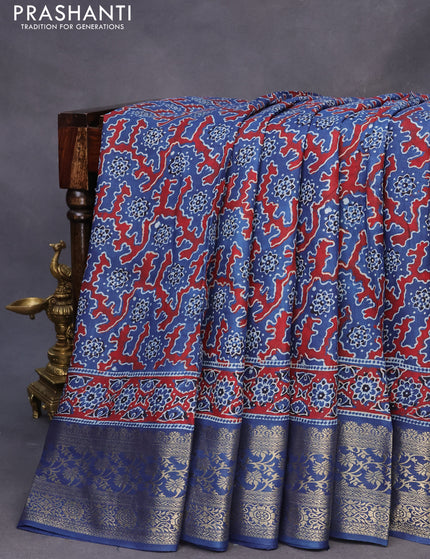 Dola silk saree blue and maroon with allover ajrakh prints and zari woven border