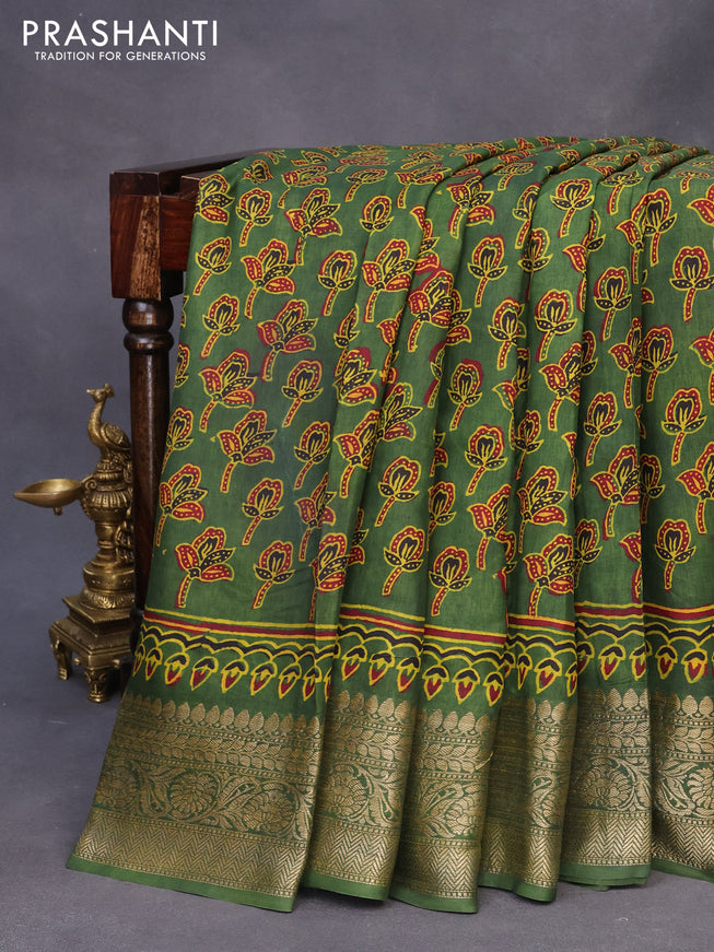 Dola silk saree green with allover ajrakh prints and zari woven border