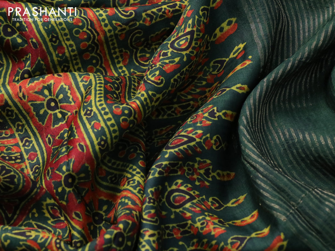 Dola silk saree dark green with allover ajrakh prints and zari woven border