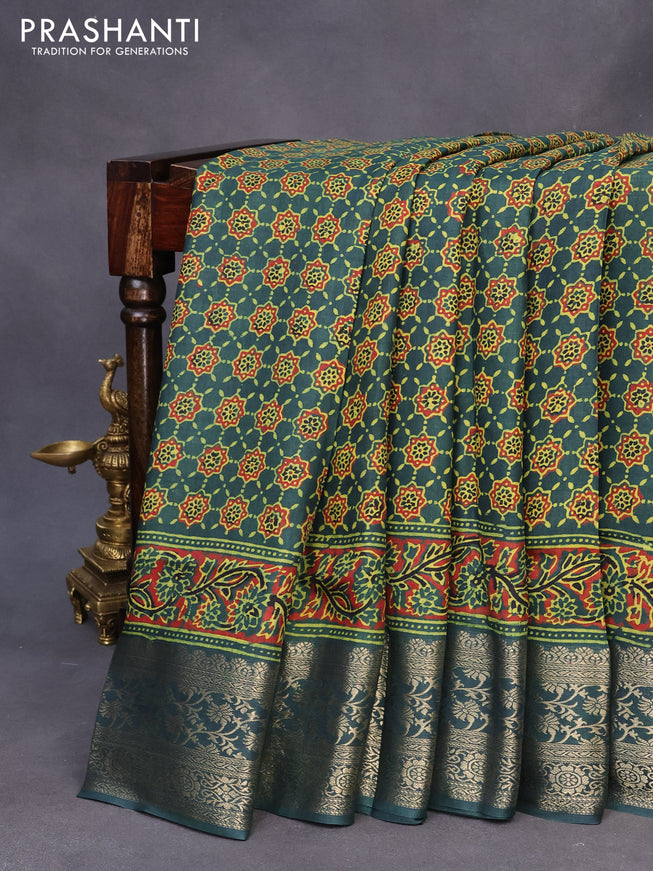 Dola silk saree green with allover ajrakh prints and zari woven border