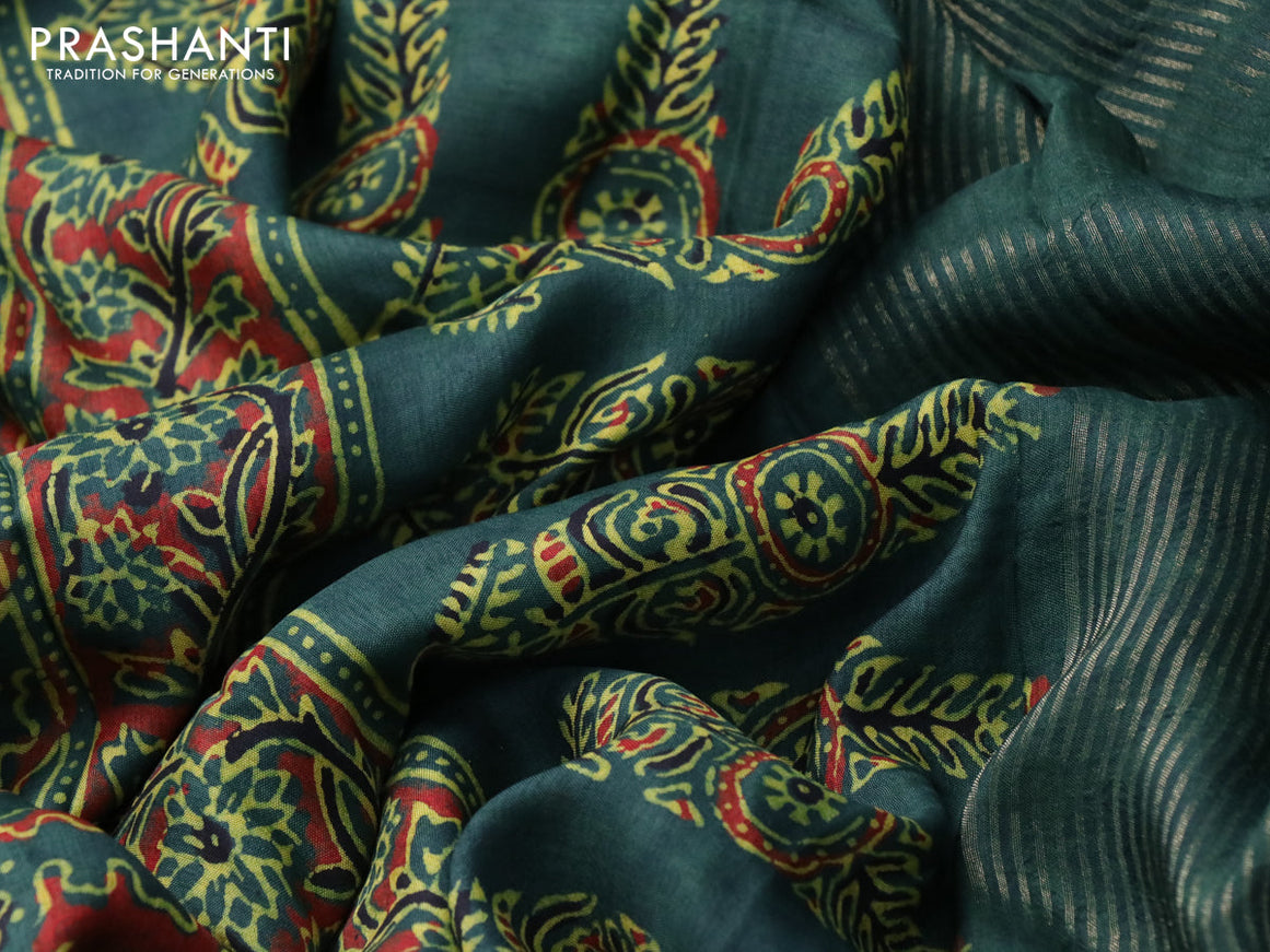 Dola silk saree green with allover ajrakh prints and zari woven border