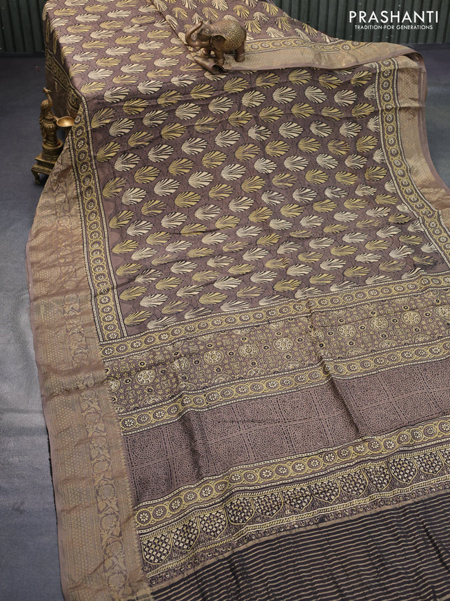 Dola silk saree brown shade with allover ajrakh prints and zari woven border