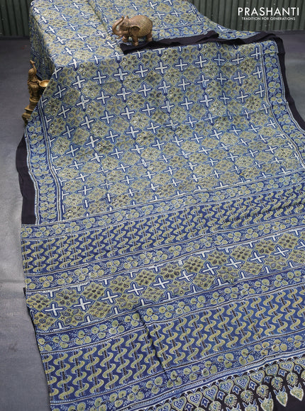 Dola silk saree blue and black with allover ajrakh prints and printed border