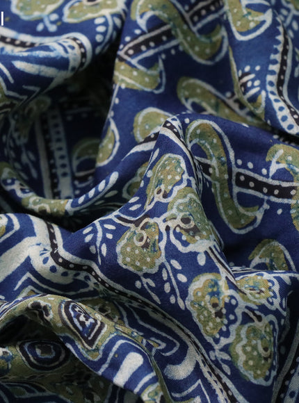 Dola silk saree blue and black with allover ajrakh prints and printed border