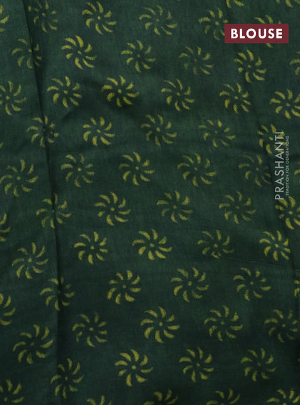 Dola silk saree dark green with allover ajrakh prints and zari woven border