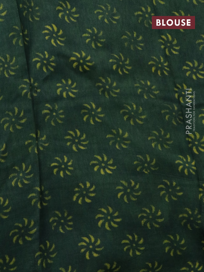 Dola silk saree dark green with allover ajrakh prints and zari woven border