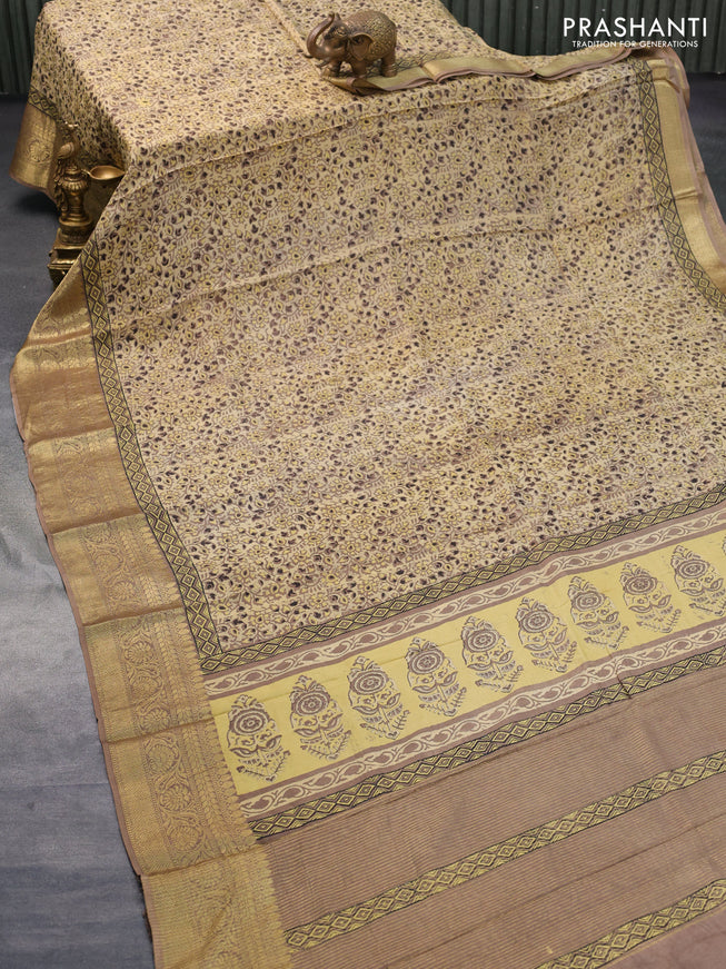 Dola silk saree beige and brown with allover ajrakh prints and zari woven border