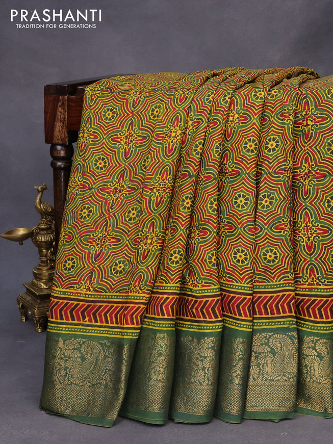 Dola silk saree green and red with allover ajrakh prints and zari woven border