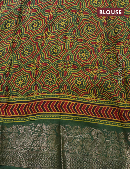 Dola silk saree green and red with allover ajrakh prints and zari woven border