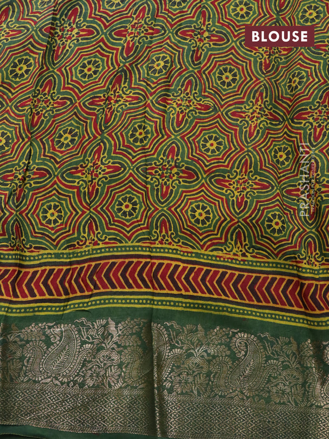 Dola silk saree green and red with allover ajrakh prints and zari woven border