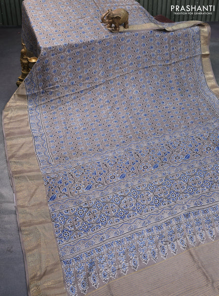 Dola silk saree grey with allover ajrakh prints and zari woven border