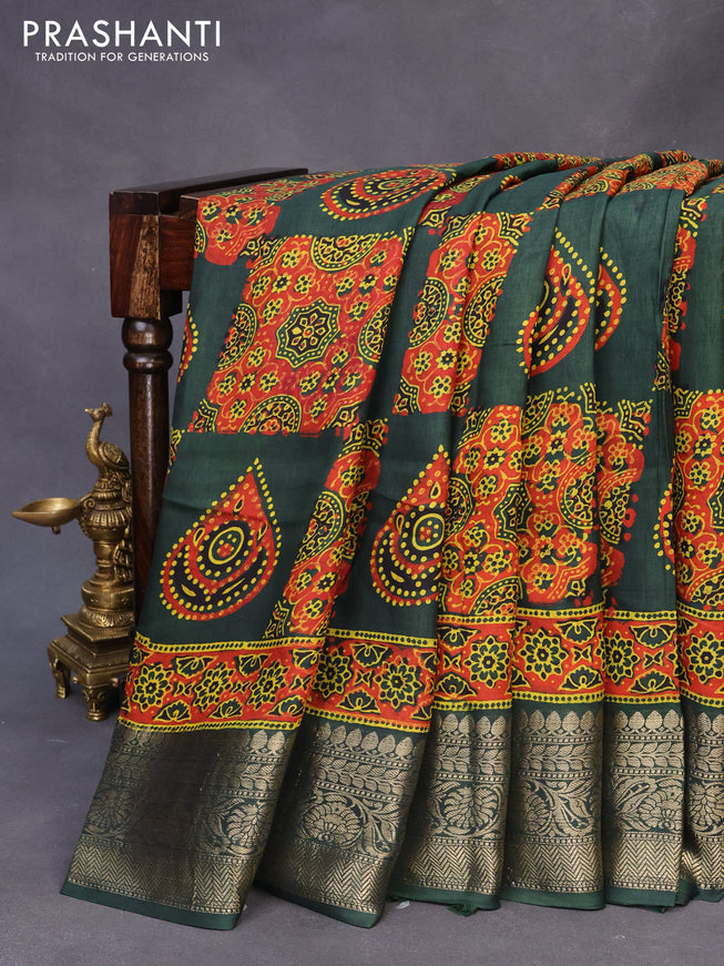 Dola silk saree green and red with allover ajrakh prints and zari woven border